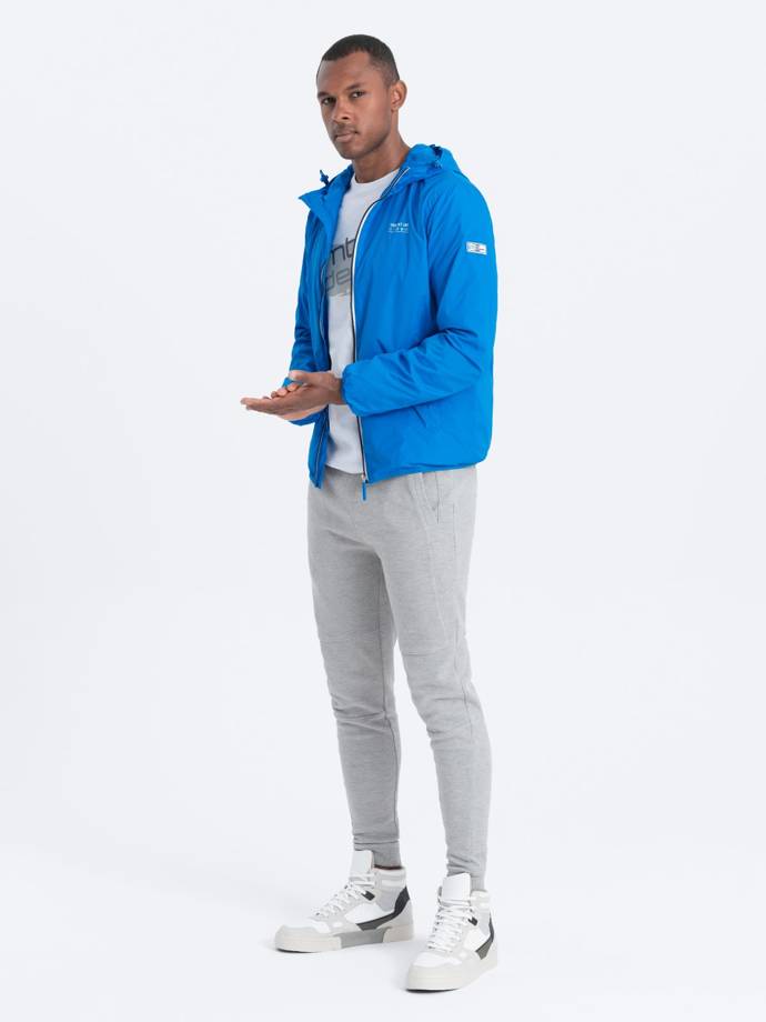 Men's windbreaker jacket with hood and contrasting details - blue V1 OM-JANP-0110