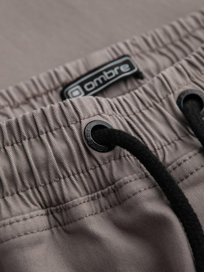 Men's JOGGER pants with zippered cargo pockets - dark beige V2 OM-PAJO-0125