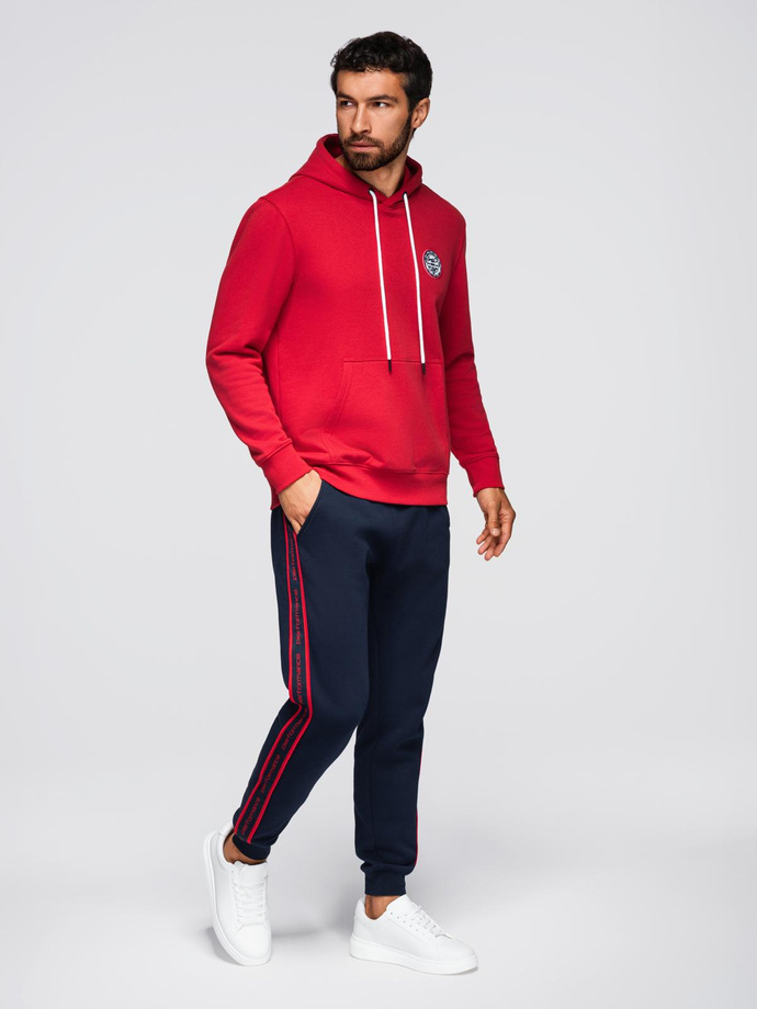 Sportowe spodnie męskie jogger z lampasami – granatowe V3 OM-PASK-0284