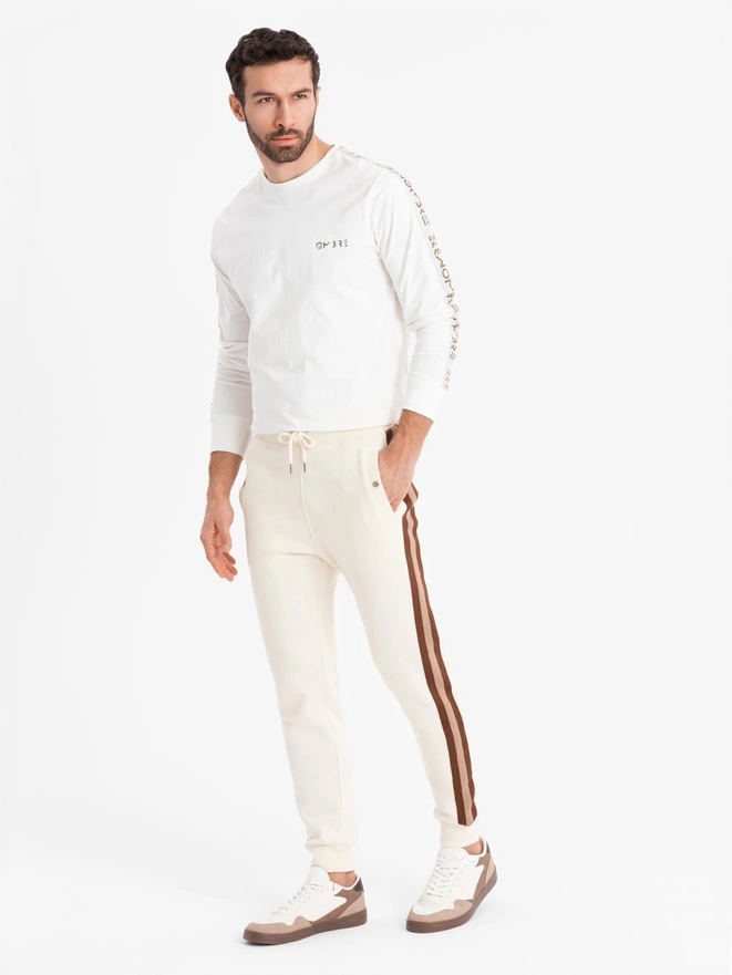 Men's sweatpants with piping and ribbing on the legs - cream V3 OM-PASK-0258