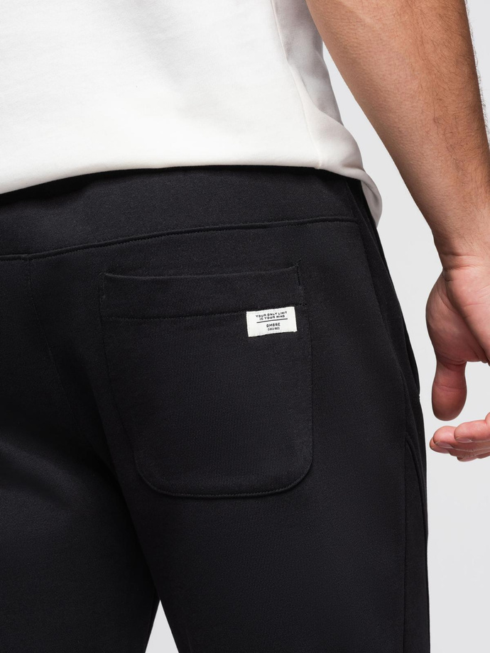 Męskie spodnie dresowe typu jogger - czarne V5 OM-PABS-0173