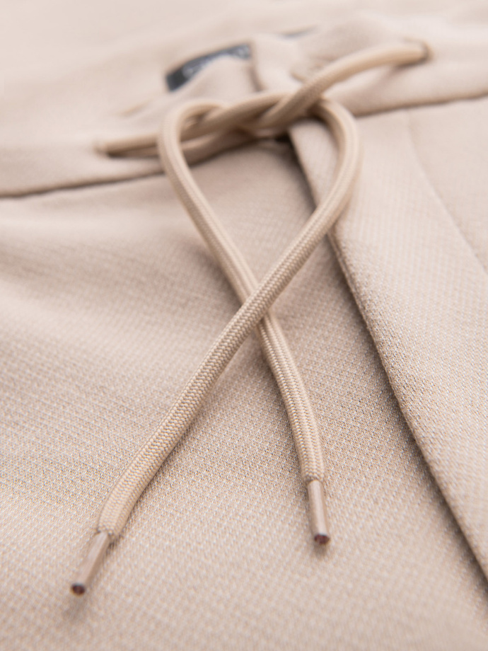 Spodnie męskie CARROT ze strukturalnej dwukolorowej dzianiny - beżowe V2 OM-PACP-0168