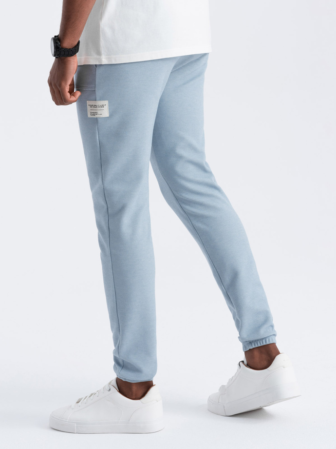 Men's structured knit sweatpants - light blue V4 OM-PASK-0211