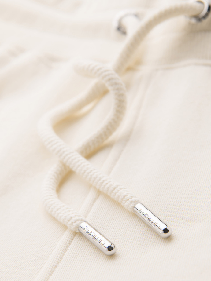 Dresowe męskie spodnie z lampasami i ściągaczami na nogawkach – kremowe V3 OM-PASK-0258