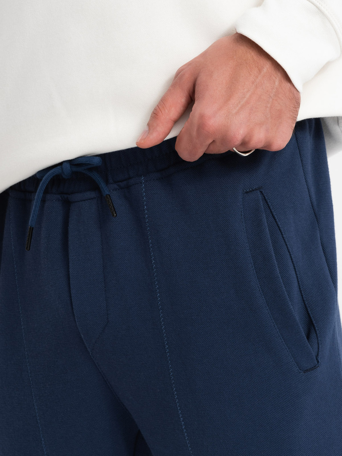 Spodnie męskie dresowe CARROT ze strukturalnej dzianiny - ciemnoniebieskie V5 OM-PASK-0143