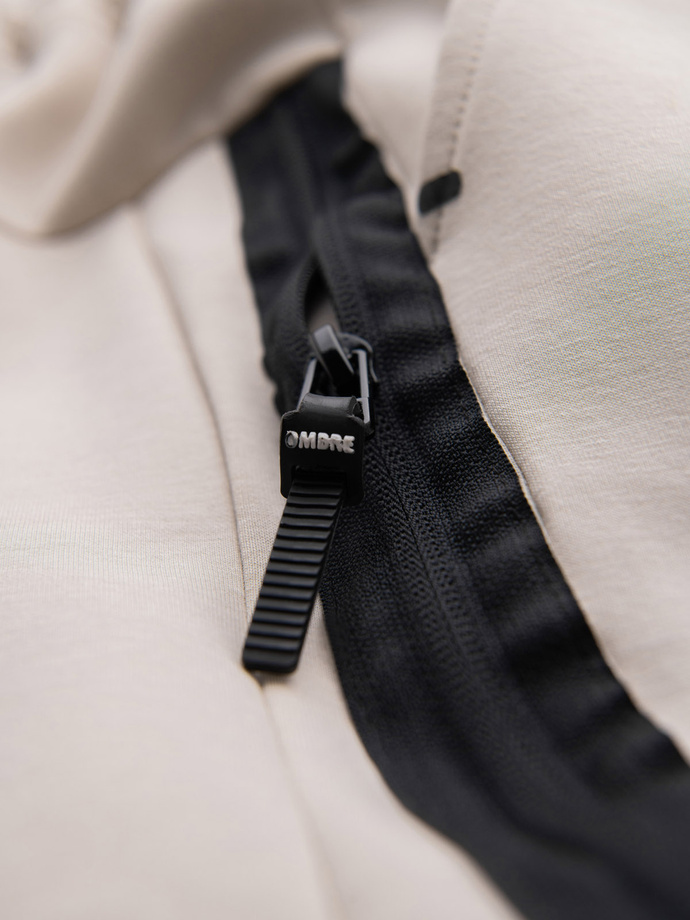 Męskie spodnie dresowe ze ściągaczami i ozdobnym zamkiem – piaskowe V6 OM-PASK-0226