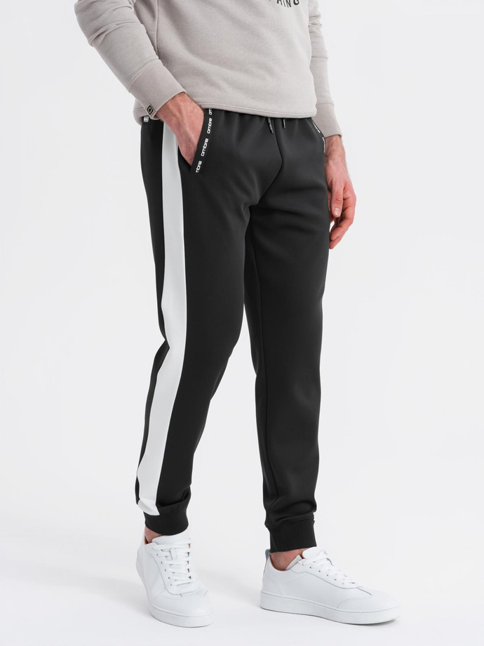 Dresowe męskie spodnie joggery z kontrastowymi lampasami – czarne V1 OM-PASK-0229