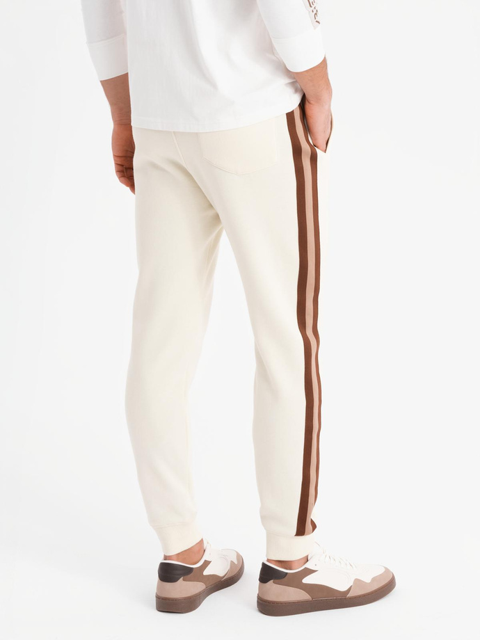 Men's sweatpants with piping and ribbing on the legs - cream V3 OM-PASK-0258