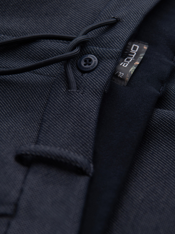 Spodnie męskie CARROT ze strukturalnej dwukolorowej dzianiny - granatowe V1 OM-PACP-0168