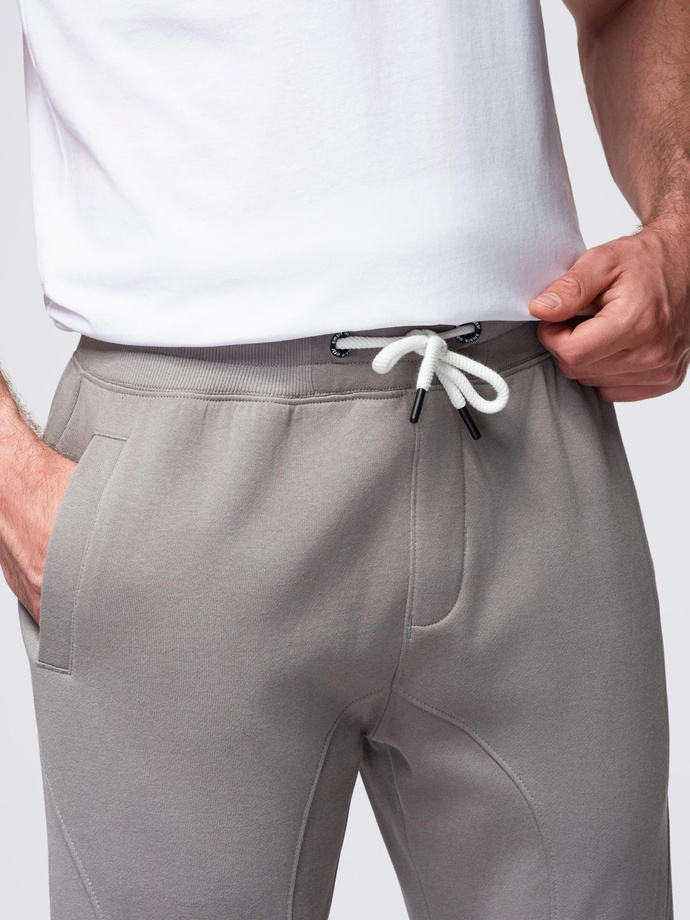 Męskie spodnie dresowe typu jogger - szare V8 OM-PABS-0173