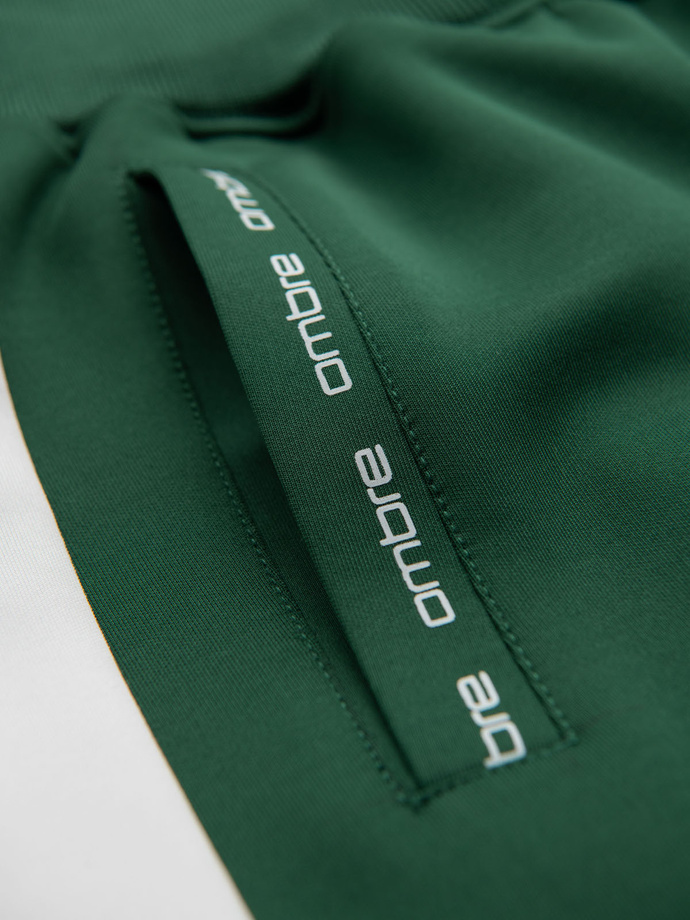 Dresowe męskie spodnie joggery z kontrastowymi lampasami – ciemnozielone V7 OM-PASK-0229