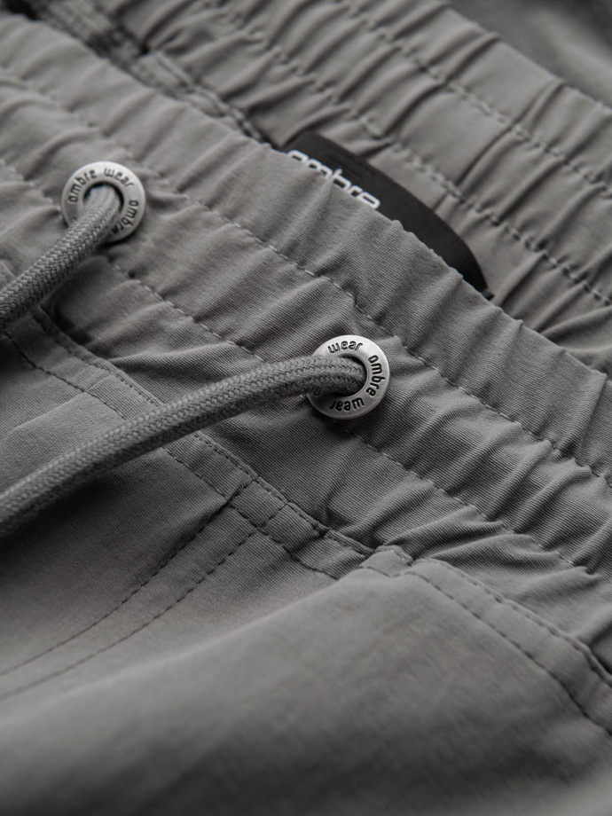 Spodnie męskie joggery z kieszeniami cargo i printem – szare V4 OM-PAJO-0200