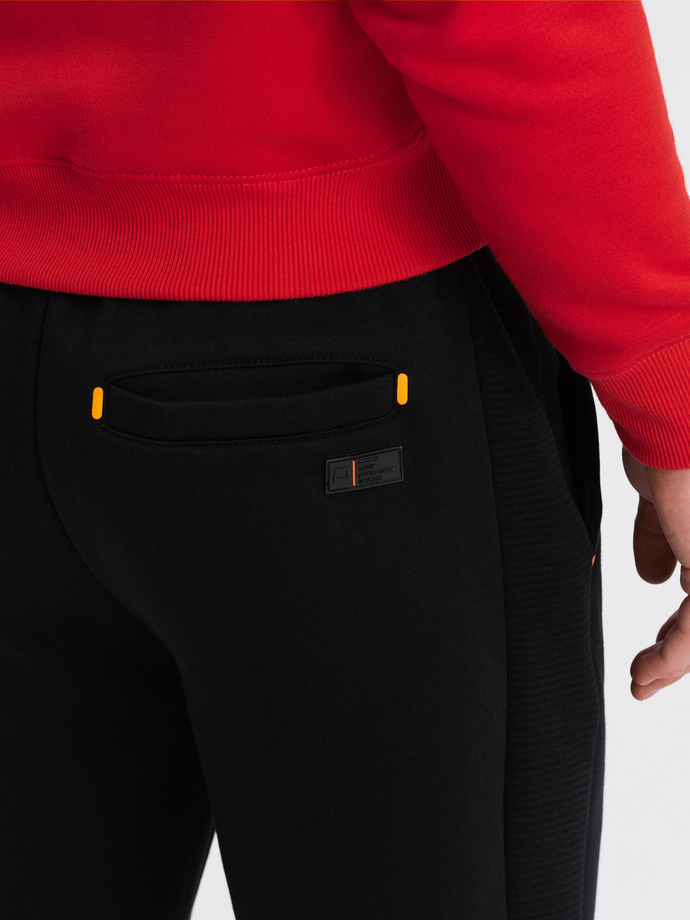 Spodnie męskie dresowe z kontrastowymi przeszyciami - czarne V1 OM-PASK-0145