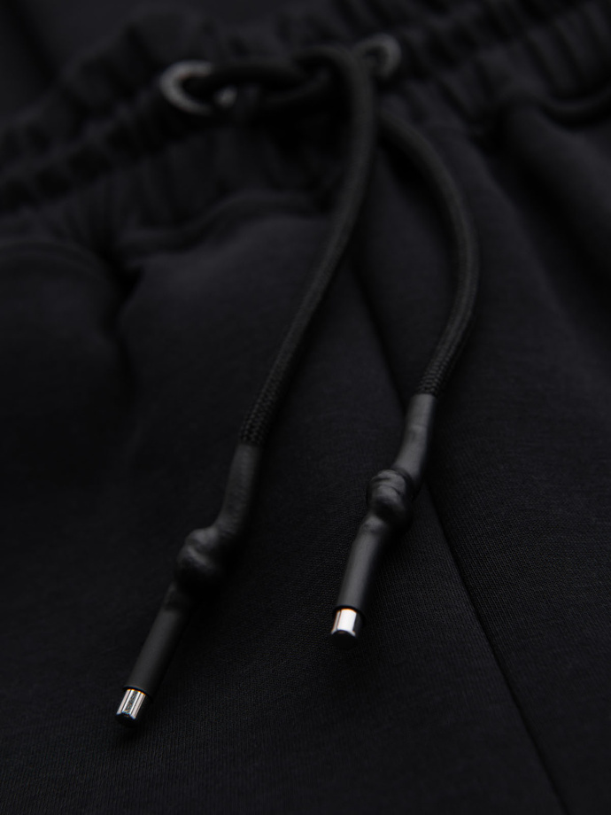 Men's sweatpants with ribbed cuffs and decorative zipper - black V3 OM-PASK-0226