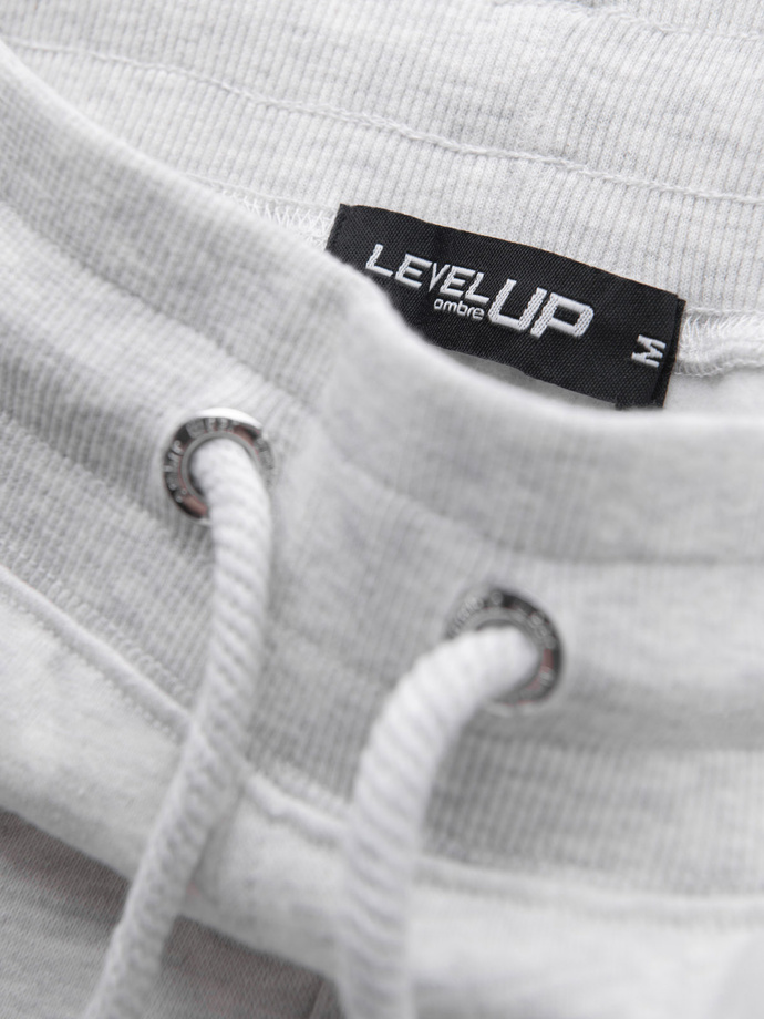 Men's sweatpants with piping and ribbing on legs - grey melange V1 OM-PASK-0258