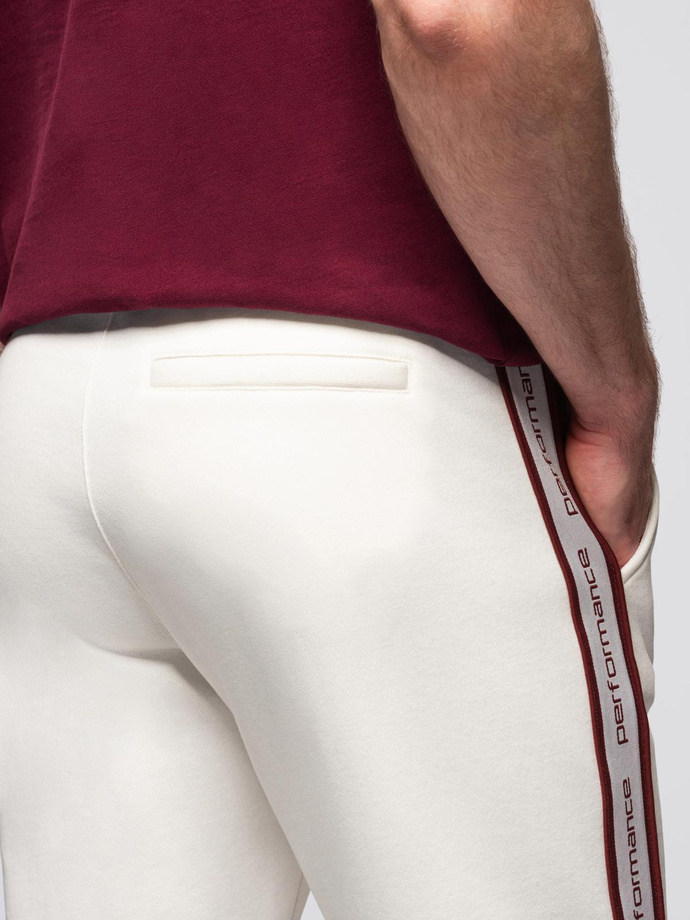 Sportowe spodnie męskie jogger z lampasami – kremowe V2 OM-PASK-0284