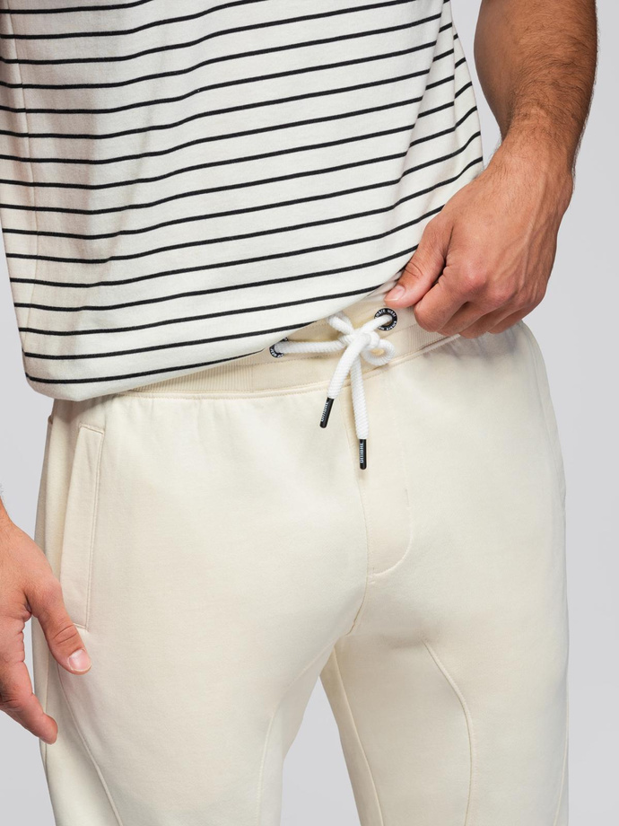Męskie spodnie dresowe typu jogger - kremowe V11 OM-PABS-0173
