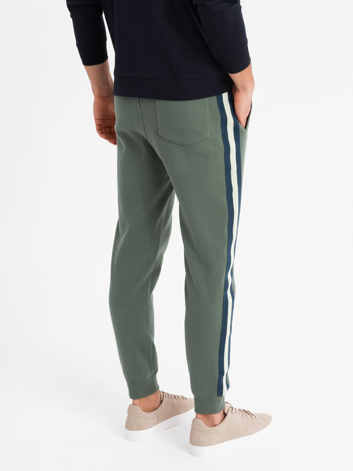 Men's sweatpants with piping and leg ribbing - olive V2 OM-PASK-0258