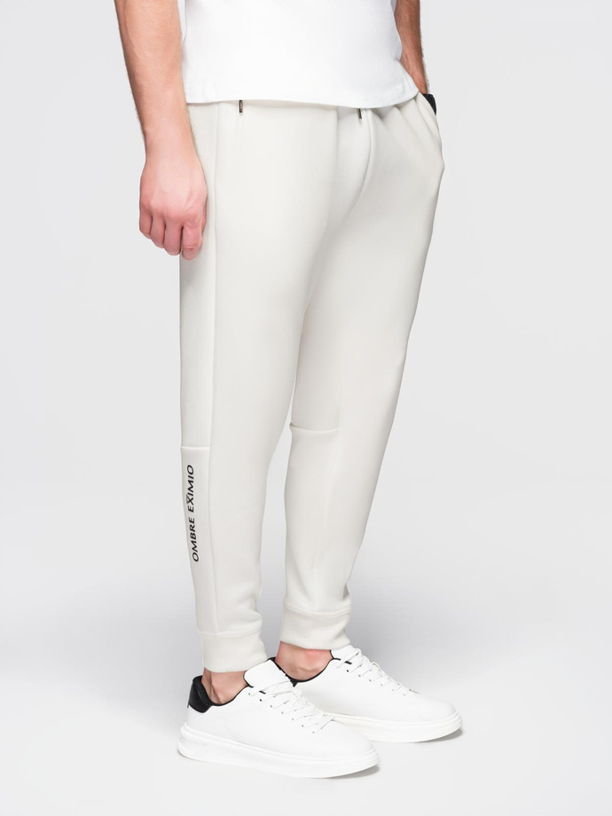Men's sweatpants with ribbed legs and rubber print - white V2 OM-PASK-0223