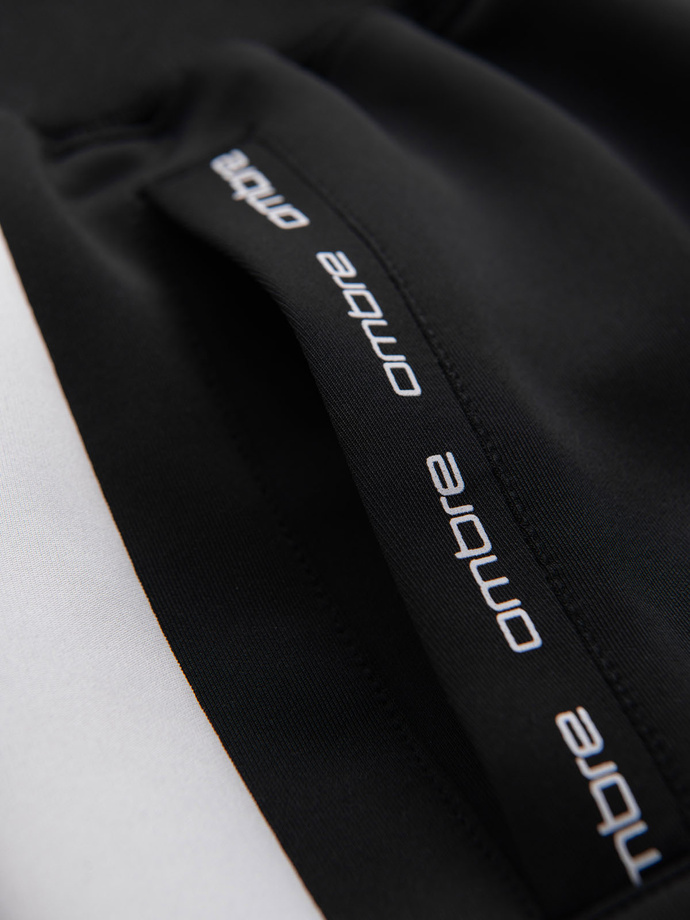 Men's sweatpants joggers with contrasting stripes - black V1 OM-PASK-0229