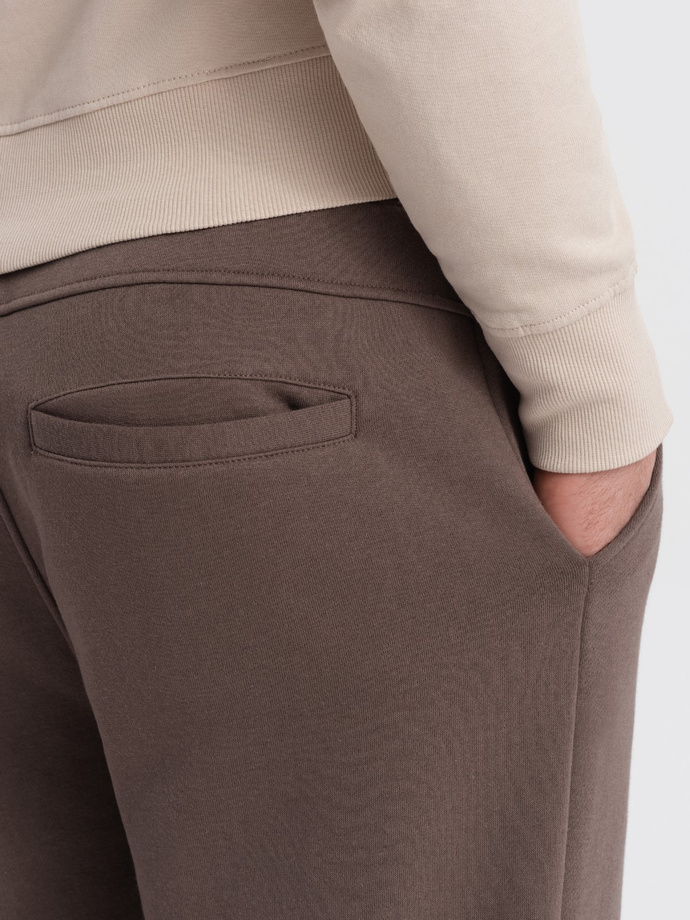 Men's sweatpants with stitching and zipper on leg - brown V4 OM-PASK-0147