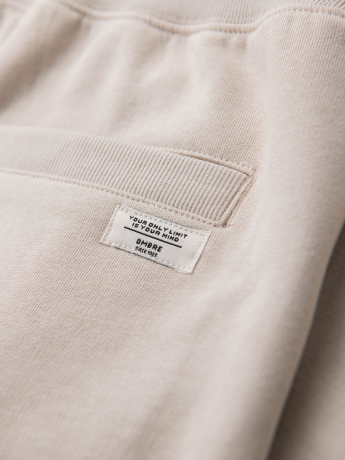 Men's knit shorts with drawstring and pockets - light beige V1 OM-SRBS-0139