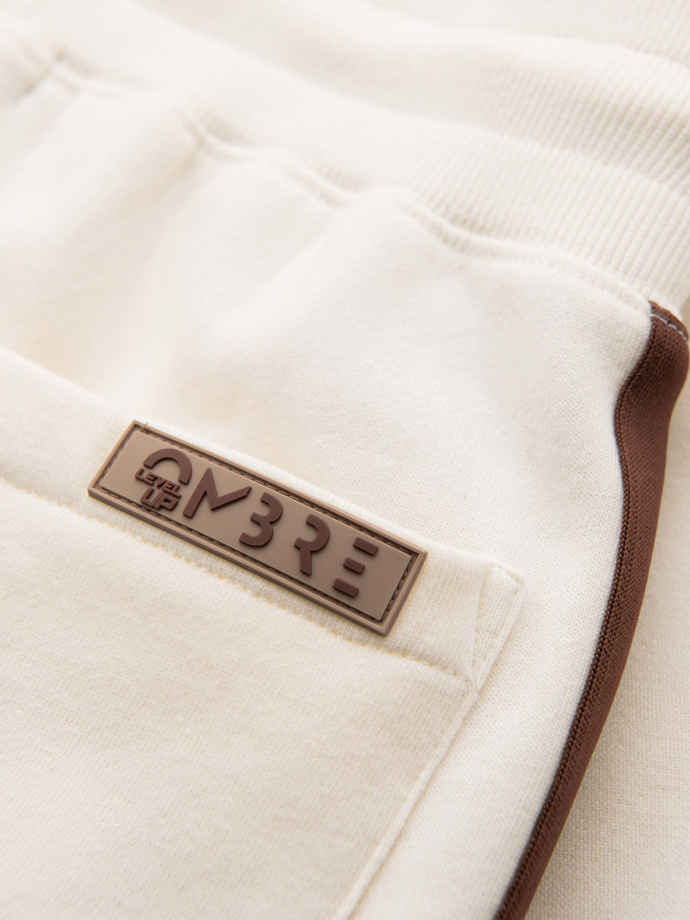 Men's sweatpants with piping and ribbing on the legs - cream V3 OM-PASK-0258