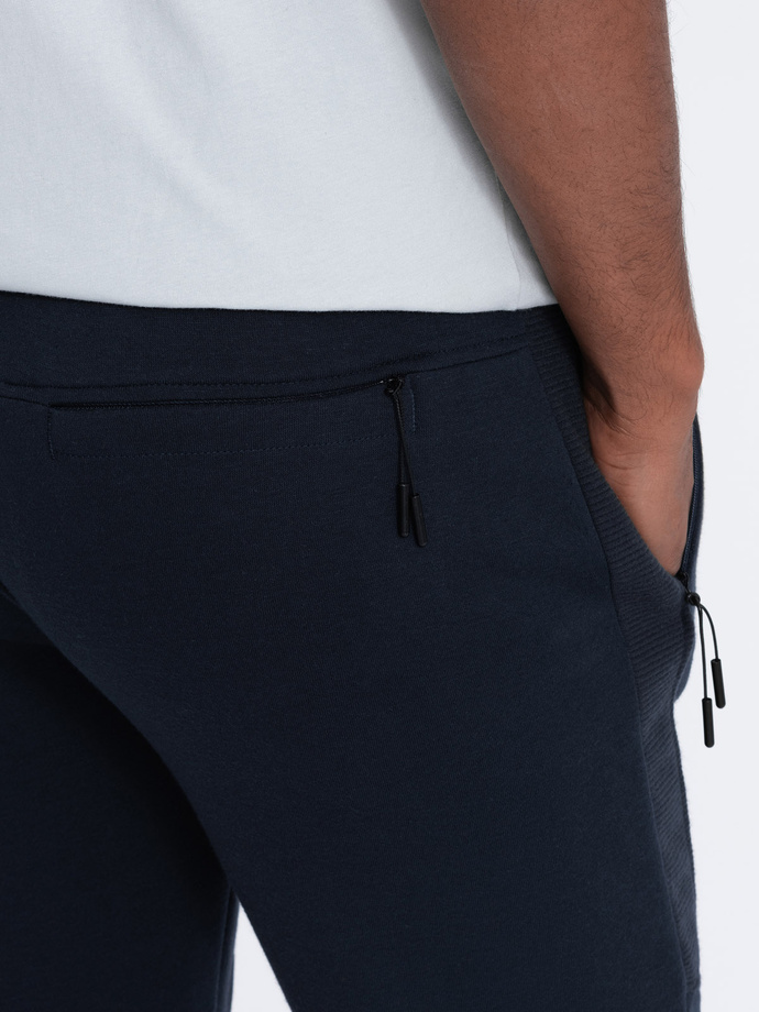 Men's sweatpants with stitching - navy blue V4 OM-PASK-0137
