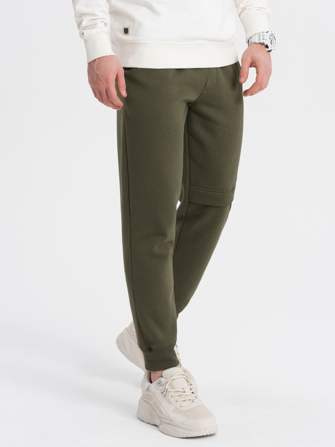 Men's sweatpants with stitching and leg zipper - olive V3 OM-PASK-0147
