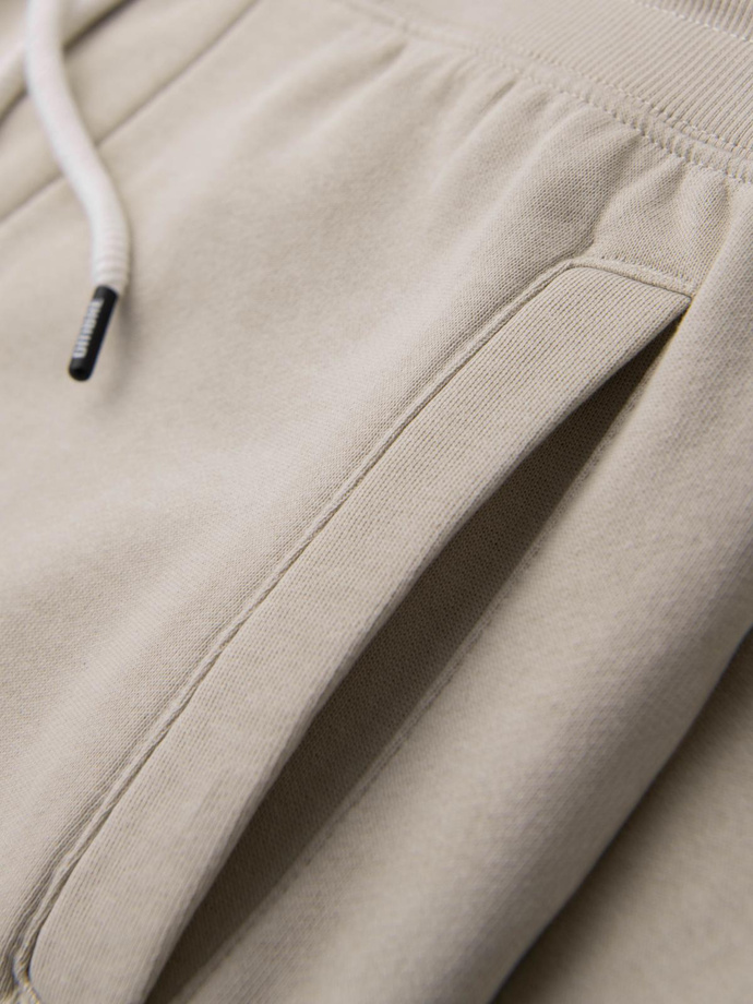 Spodnie męskie dresowe typu jogger - jasnobeżowe V1 OM-PABS-0173