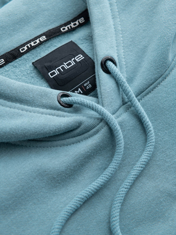 Męska dresowa bluza kangurka z kapturem i metalowym pinem – błękitna V4 OM-SSNZ-0141