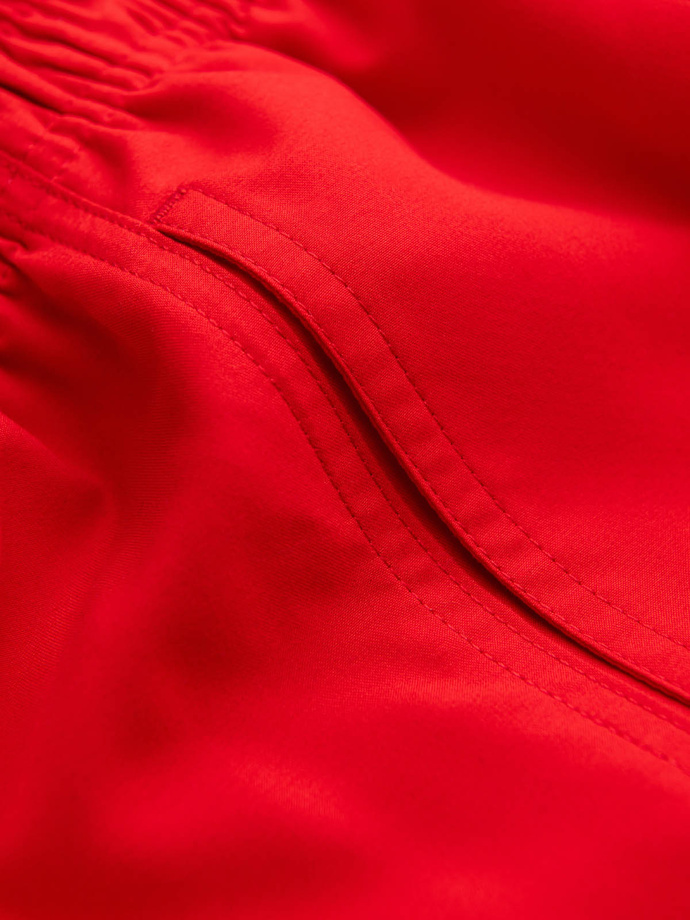 Neonowe szorty męskie kąpielowe z efektem magic print – czerwone V5 OM-SRBS-0147