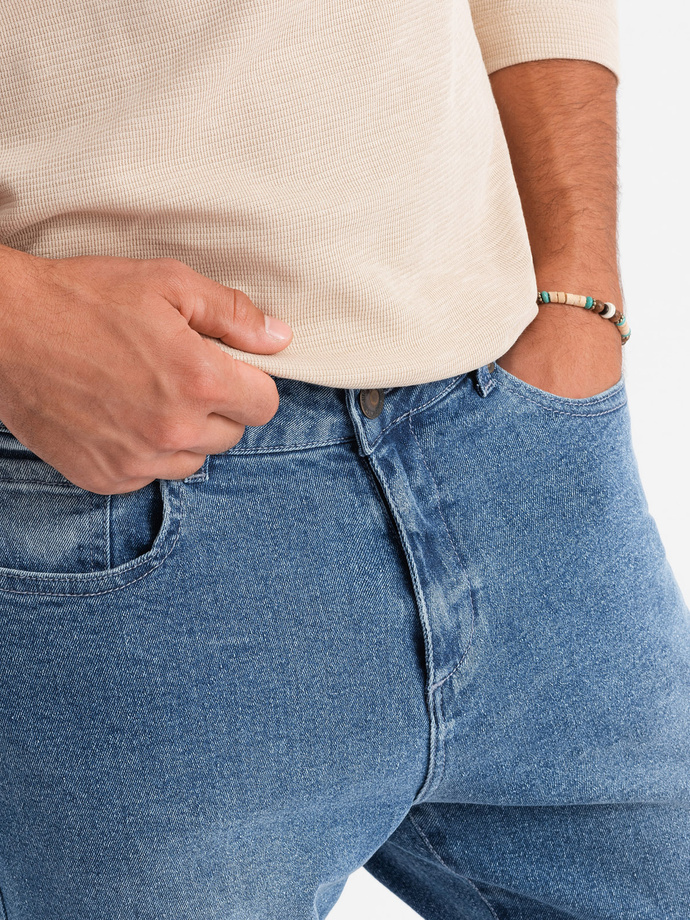 Męskie jeansowe spodnie CARROT FIT z delikatnymi przetarciami – niebieskie V1 OM-PADP-0162