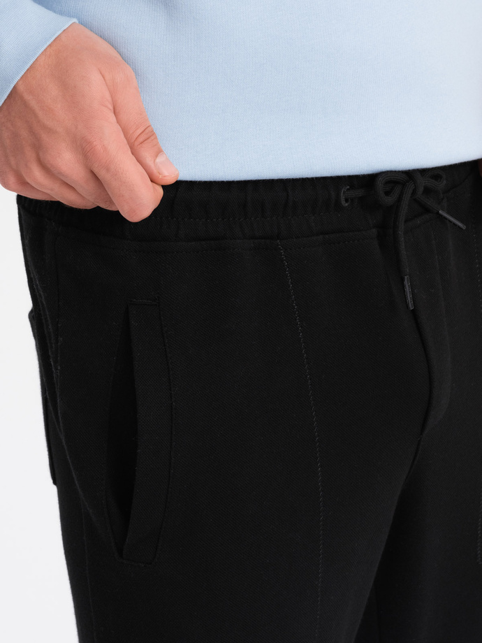 Spodnie męskie dresowe CARROT ze strukturalnej dzianiny - czarne V8 OM-PASK-0143