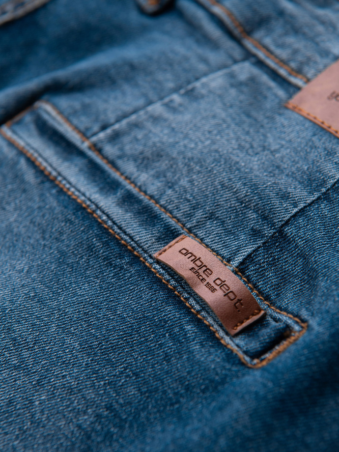 Męskie spodnie jeansowe CARROT z przetarciami - niebieskie V2 OM-PADP-0253