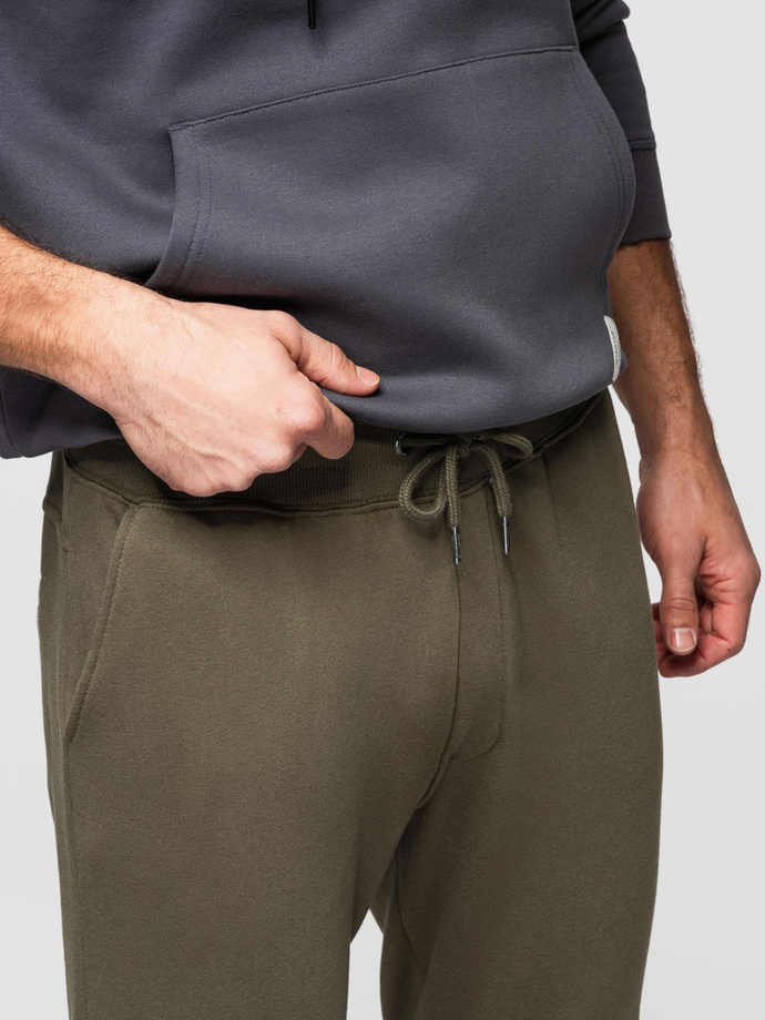 Men's sweatpants with stitching and leg zipper - olive V3 OM-PASK-0147