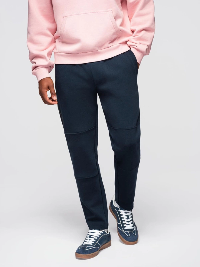 Spodnie męskie dresowe z prostą nogawką i gumowymi detalami – ciemnoniebieskie V2 OM-PASK-0281