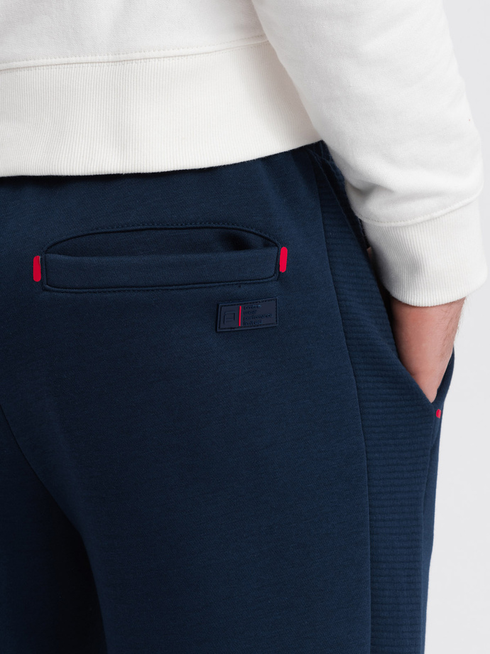 Men's sweatpants with contrast stitching - navy blue V4 OM-PASK-0145
