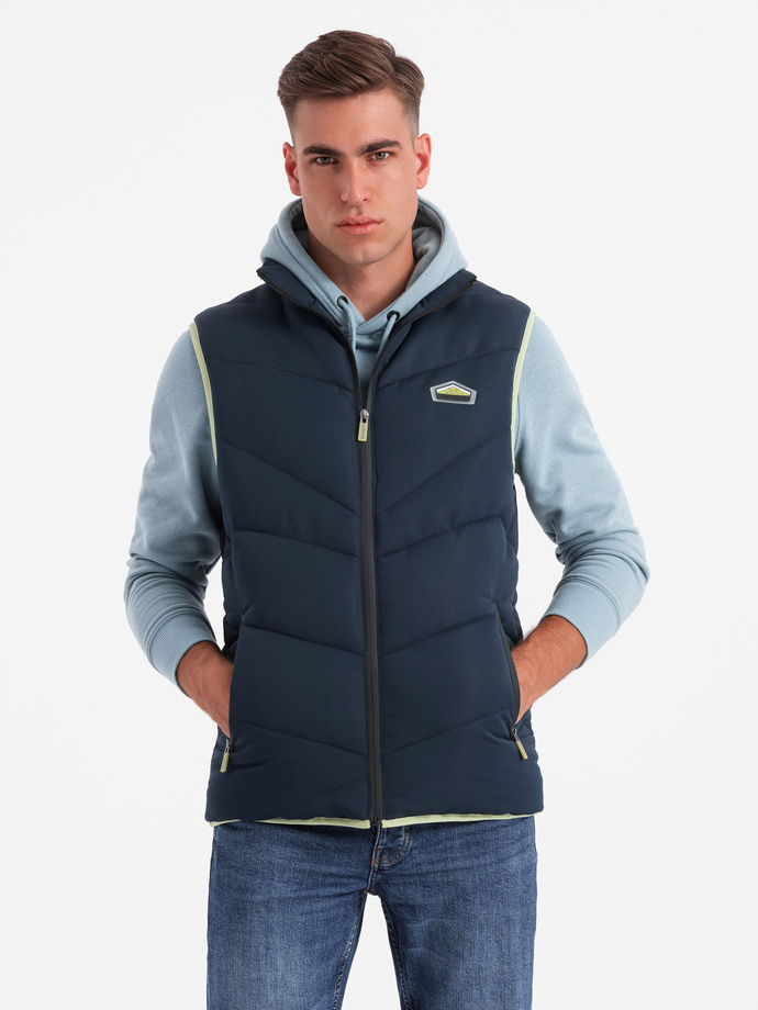 Men's quilted sleeveless jacket with neon accents - navy blue V3 OM-JAVJ-0210