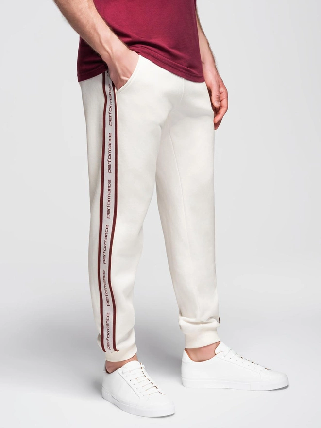 Sportowe spodnie męskie jogger z lampasami – kremowe V2 OM-PASK-0284