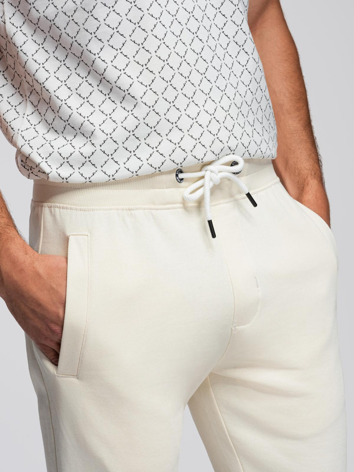 Męskie spodnie dresowe z nogawką bez ściągacza - kremowe V11 OM-PABS-0206