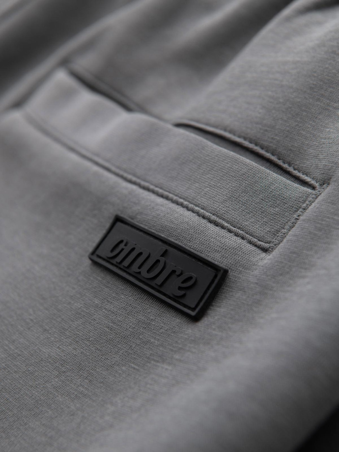 Dresowe spodnie męskie z prostą nogawką i gumowymi detalami – szare V3 OM-PASK-0281