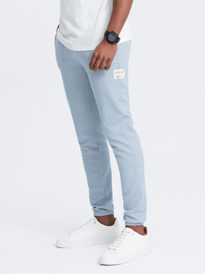 Men's structured knit sweatpants - light blue V4 OM-PASK-0211