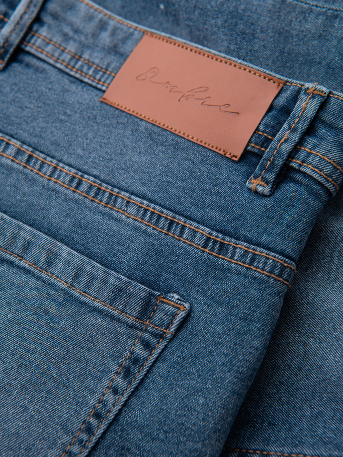 Krótkie męskie spodenki jeansowe z przetarciami i podwiniętą nogawką – niebieskie V2 OM-SRDS-0186