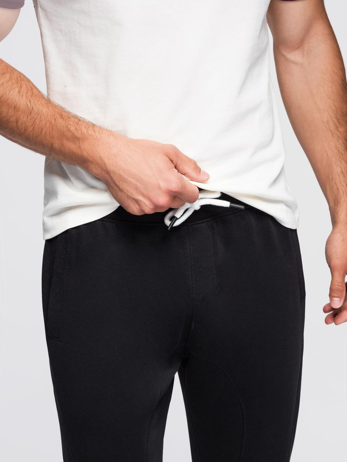 Męskie spodnie dresowe typu jogger - czarne V5 OM-PABS-0173