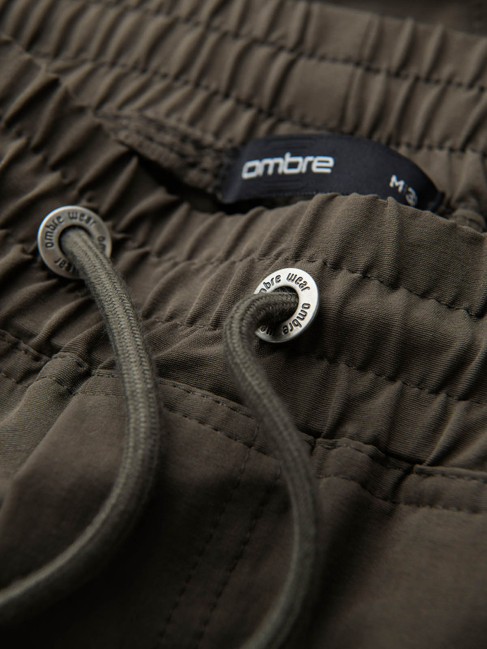 Men's jogger pants with cargo pockets and print - dark olive green V5 OM-PAJO-0200