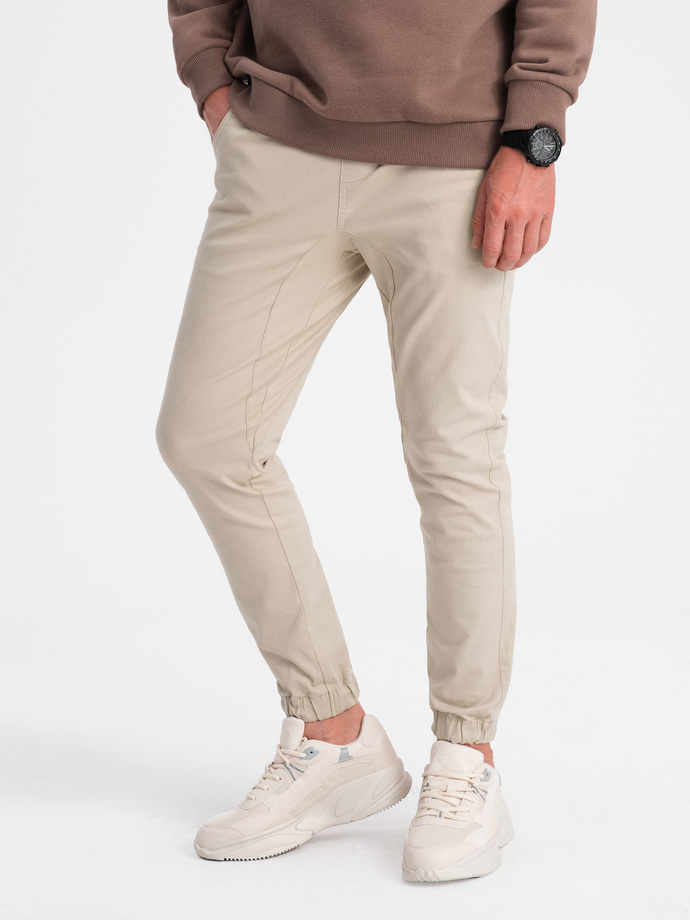 Spodnie męskie materiałowe JOGGERY - beżowe V10 P885