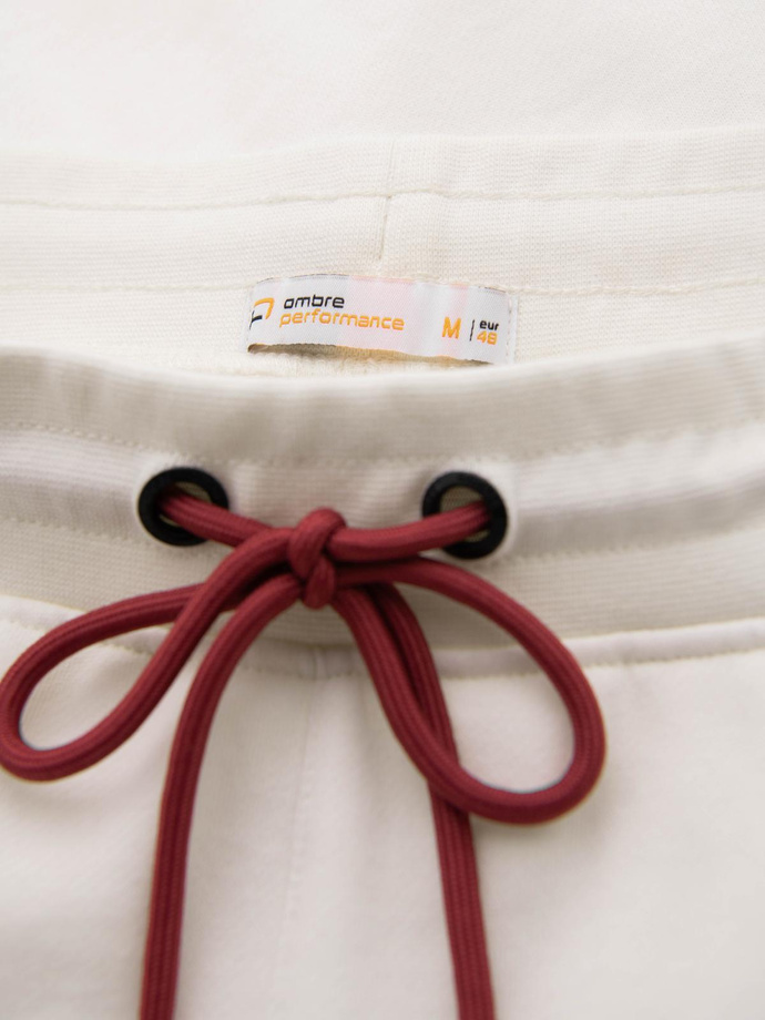 Sportowe spodnie męskie jogger z lampasami – kremowe V2 OM-PASK-0284