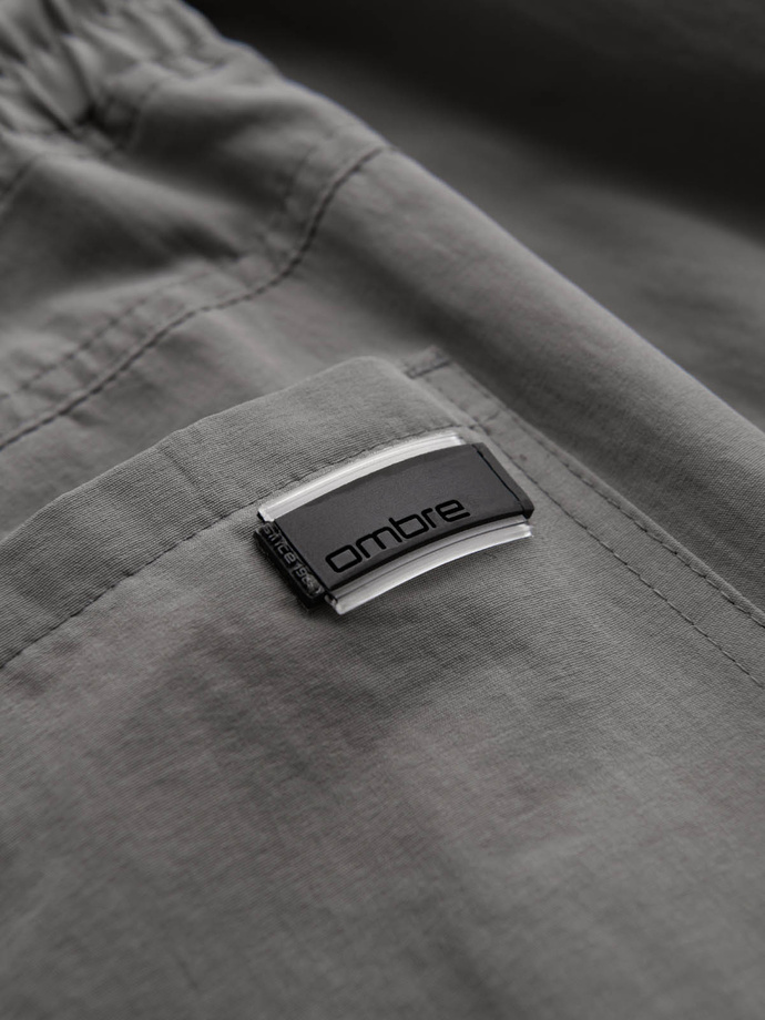 Spodnie męskie joggery z kieszeniami cargo i printem – szare V4 OM-PAJO-0200