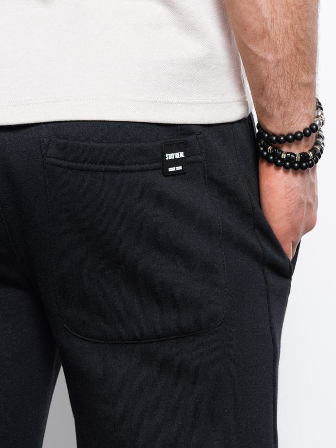 Spodnie męskie dresowe - czarne V3 P866